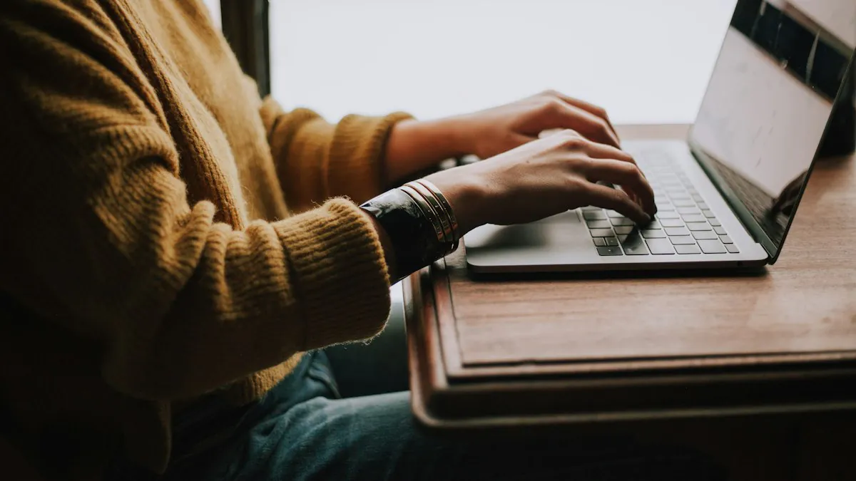 Person completing a health plan enrollment workflow on a laptop