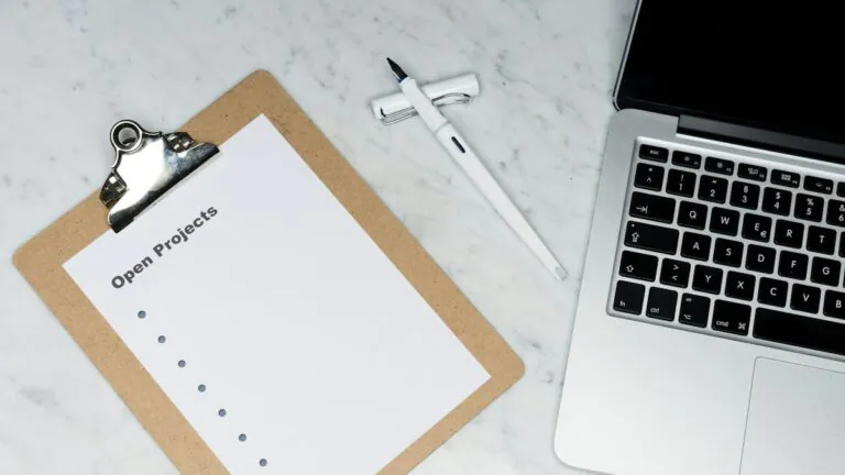 Compliance checklist and laptop used for a credentialing standards review